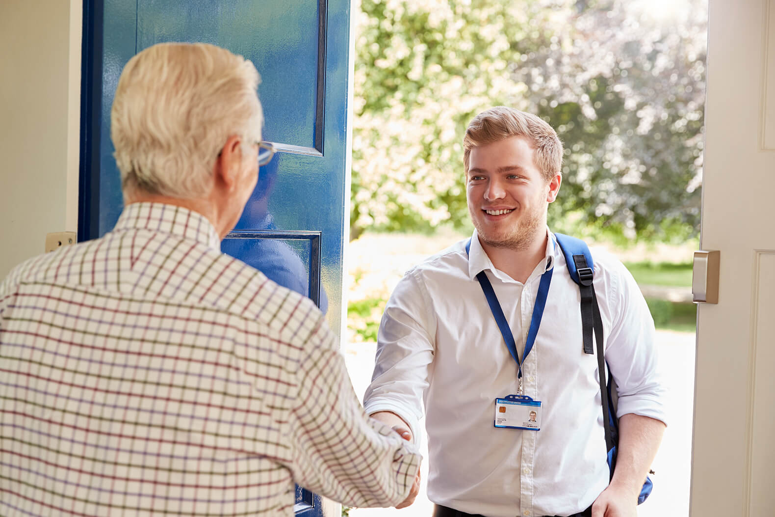 Care worker showing identification